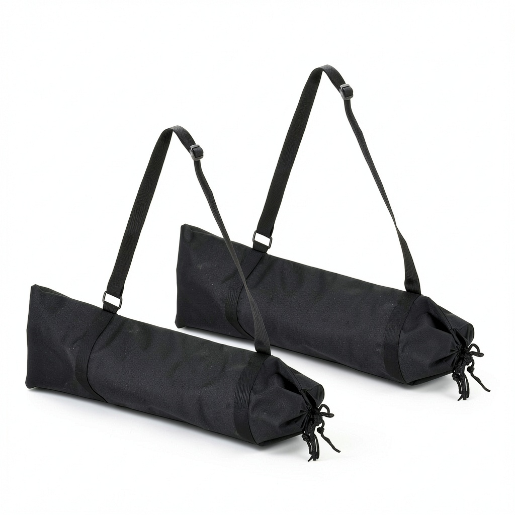 Black nylon tripod bag showing padded interior and handles