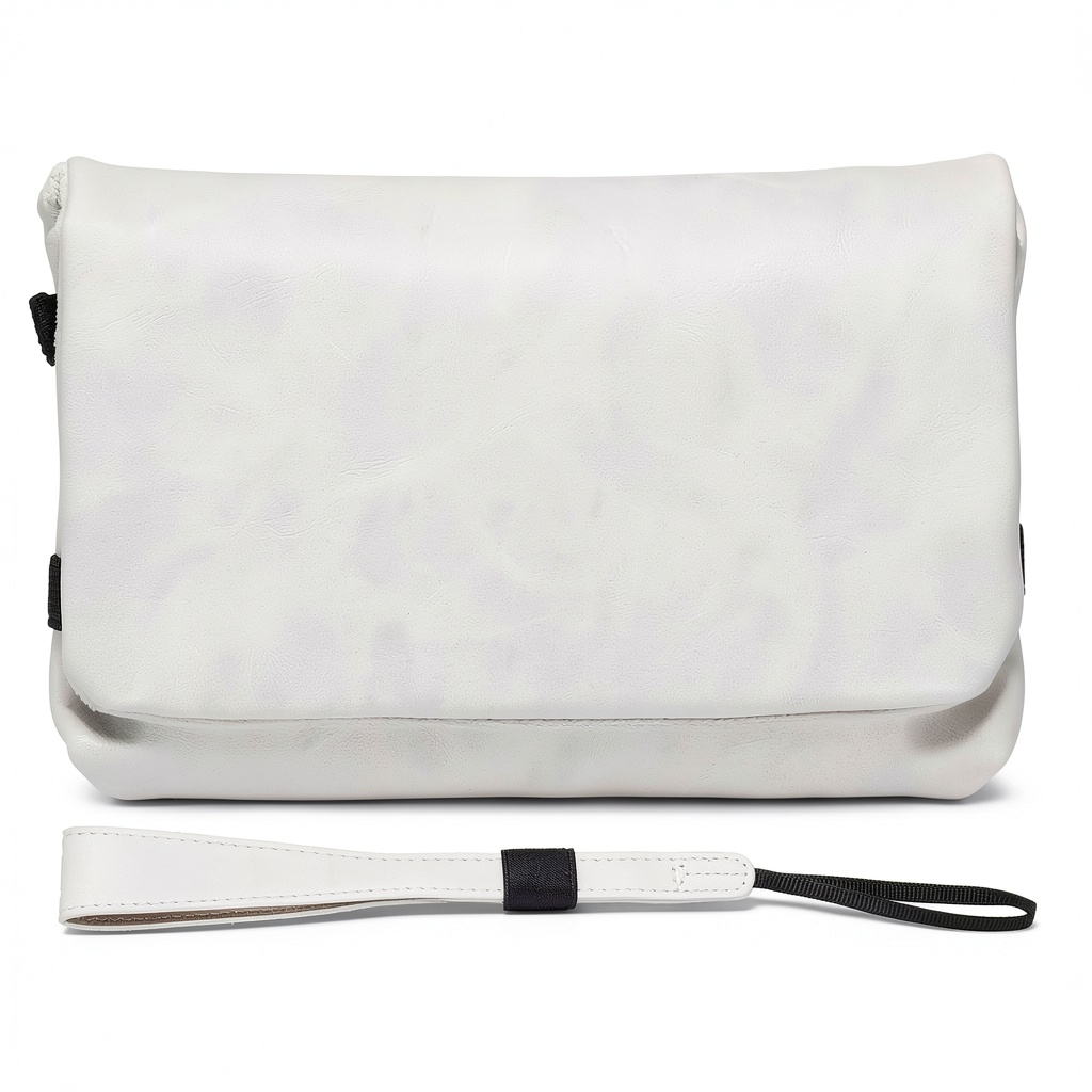 Portable nylon camera storage bag in various colors on a table